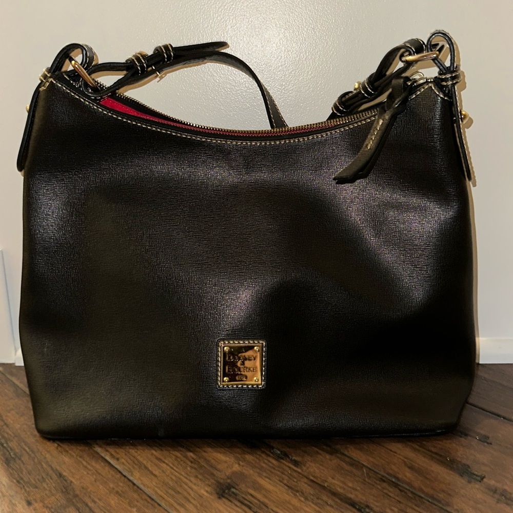 Black and gold Dooney and Bourke purse